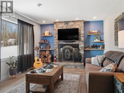 13323 Torvan Subdivision, Dawson Creek, BC - Indoor Photo Showing Living Room With Fireplace