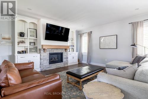 19 Cheslock Crescent, Oro-Medonte, ON - Indoor Photo Showing Living Room With Fireplace