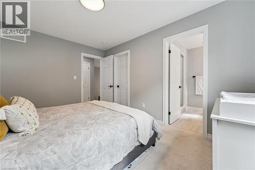 Bedroom with carpet and connected bathroom - 628 Florencedale Crescent, Kitchener, ON - Indoor Photo Showing Bedroom
