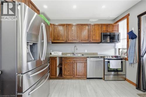 570 Cannon Street E, Hamilton, ON - Indoor Photo Showing Kitchen With Double Sink