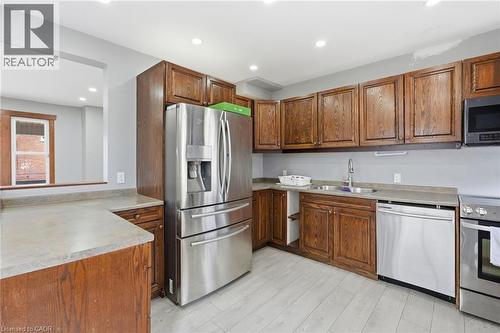 570 Cannon Street E, Hamilton, ON - Indoor Photo Showing Kitchen With Double Sink