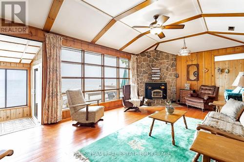 1697 Champlain Road, Tiny, ON - Indoor Photo Showing Living Room With Fireplace