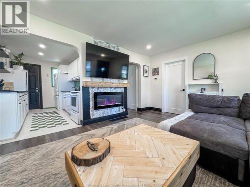1704 Central, Windsor, ON - Indoor Photo Showing Living Room With Fireplace