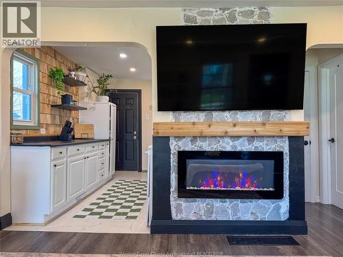 1704 Central, Windsor, ON - Indoor Photo Showing Living Room With Fireplace