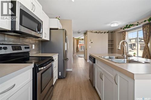 5001 Cornell Gate, Regina, SK - Indoor Photo Showing Kitchen With Stainless Steel Kitchen With Double Sink