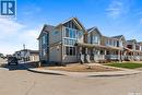 5001 Cornell Gate, Regina, SK  - Outdoor With Deck Patio Veranda With Facade 