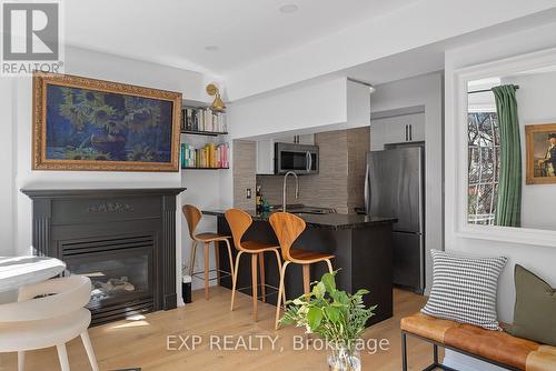 675 - 3 Everson Drive, Toronto, ON - Indoor Photo Showing Living Room With Fireplace