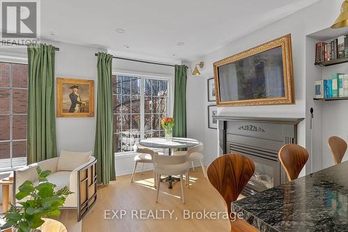 675 - 3 Everson Drive, Toronto, ON - Indoor Photo Showing Dining Room With Fireplace
