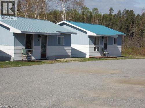 Ranch-style home with a metal roof and a porch - 5032 E Trans-Canada Highway, White River, ON 