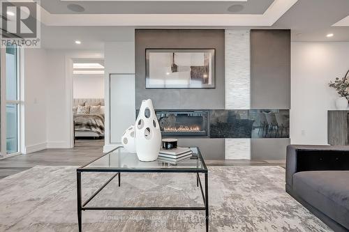 608 - 2060 Lakeshore Road, Burlington, ON - Indoor Photo Showing Other Room With Fireplace