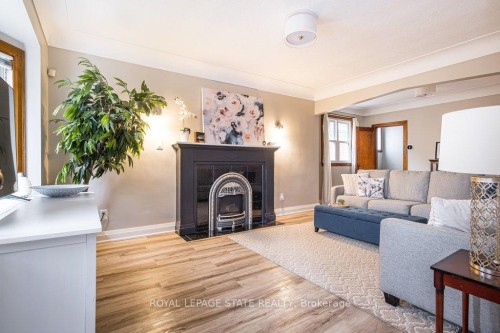 143 Huxley Avenue S, Hamilton, ON - Indoor Photo Showing Living Room With Fireplace