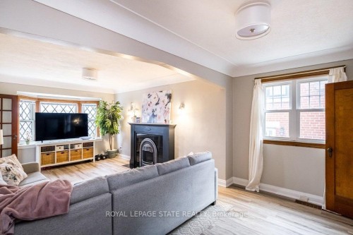 143 Huxley Avenue S, Hamilton, ON - Indoor Photo Showing Living Room With Fireplace