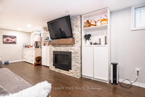 143 Huxley Avenue S, Hamilton, ON - Indoor Photo Showing Living Room With Fireplace