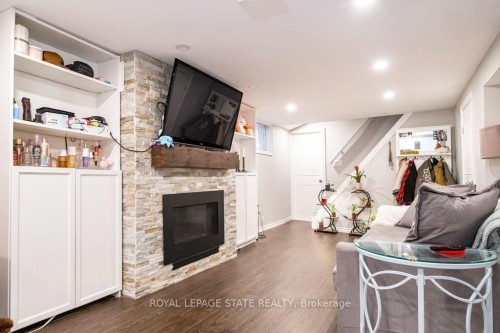 143 Huxley Avenue S, Hamilton, ON - Indoor Photo Showing Living Room With Fireplace