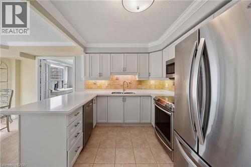 1272 Ontario Street Unit# 404, Burlington, ON - Indoor Photo Showing Kitchen With Double Sink With Upgraded Kitchen
