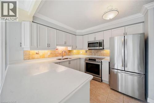 1272 Ontario Street Unit# 404, Burlington, ON - Indoor Photo Showing Kitchen With Double Sink