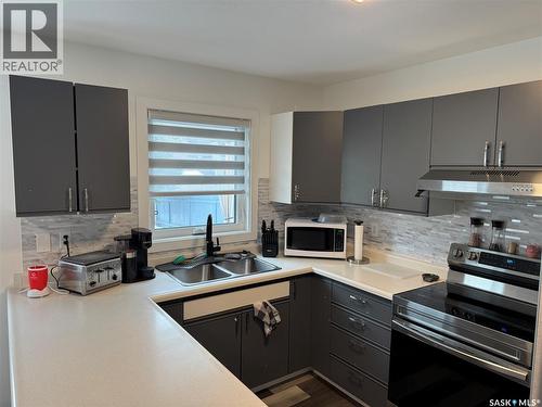 132 Barber Crescent, Saskatoon, SK - Indoor Photo Showing Kitchen With Double Sink