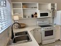 3027 Robinson Street, Regina, SK  - Indoor Photo Showing Kitchen With Double Sink 