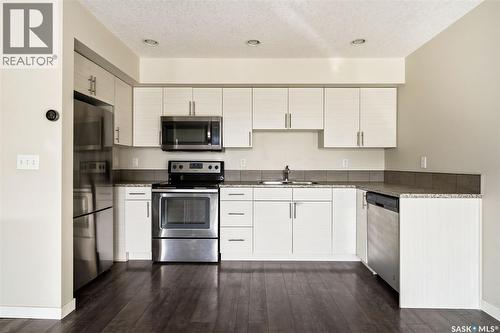 2 5752 Gordon Road, Regina, SK - Indoor Photo Showing Kitchen With Double Sink