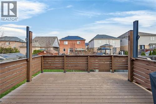 Wooden terrace featuring a residential view - 97 Sirente Drive, Hamilton, ON - Outdoor With Deck Patio Veranda