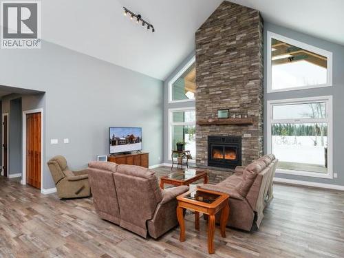 348 Dusty Trail, Whitehorse North, YT - Indoor Photo Showing Living Room With Fireplace