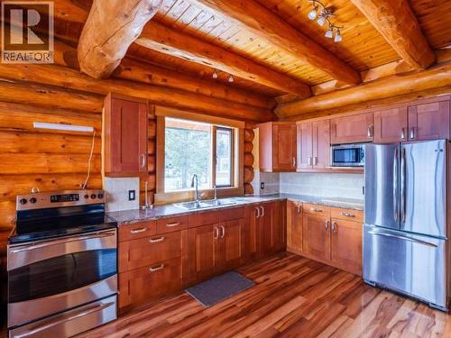 348 Dusty Trail, Whitehorse North, YT - Indoor Photo Showing Kitchen With Double Sink