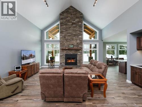 348 Dusty Trail, Whitehorse North, YT - Indoor Photo Showing Living Room With Fireplace