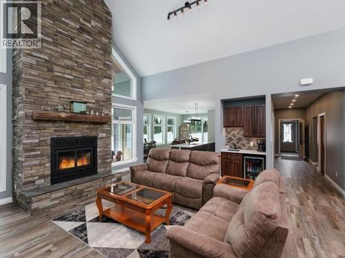 348 Dusty Trail, Whitehorse North, YT - Indoor Photo Showing Living Room With Fireplace