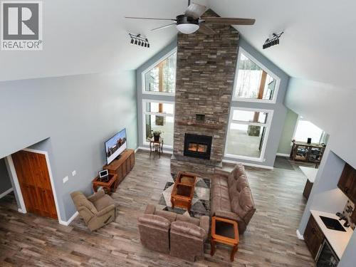 348 Dusty Trail, Whitehorse North, YT - Indoor Photo Showing Living Room With Fireplace