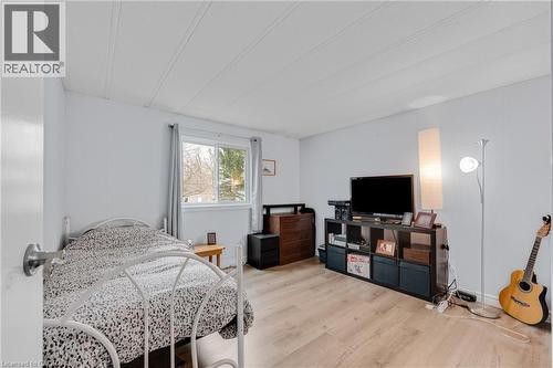 Bedroom featuring light wood-type flooring - 157 Maple Crescent, Hamilton, ON - Indoor Photo Showing Bedroom