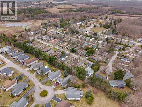 Aerial overview of property's location with nearby suburban area and a nearby body of water - 157 Maple Crescent, Hamilton, ON - Outdoor With View
