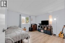 Bedroom featuring light wood-type flooring - 