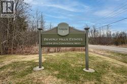 Community sign with a lawn - 