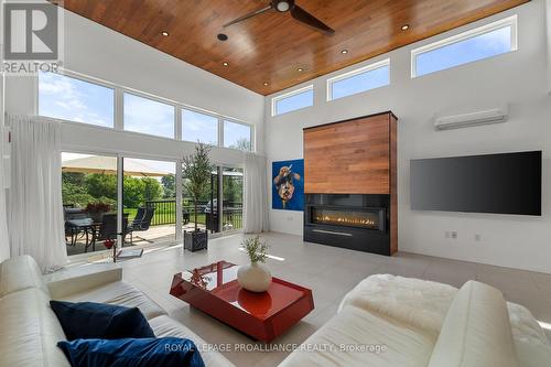 2670 County Road 8, Prince Edward County (North Marysburg Ward), ON - Indoor Photo Showing Living Room With Fireplace