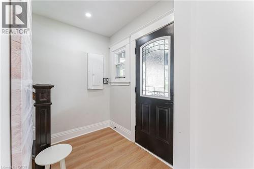 Bright entrance with hardwood floors & 3 separate units. - 15 Barnesdale Avenue N, Hamilton, ON - Indoor Photo Showing Other Room