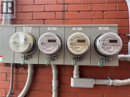 Separate Hydro Meters - 15 Barnesdale Avenue N, Hamilton, ON - Indoor Photo Showing Laundry Room