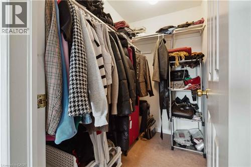 Walk in closet with light carpet - 27 Red Clover Crescent, Kitchener, ON - Indoor With Storage