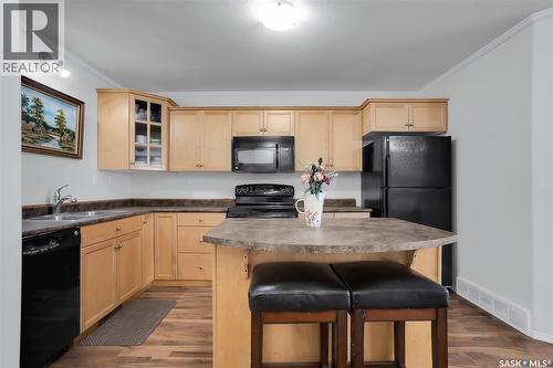 1406 715 Hart Road, Saskatoon, SK - Indoor Photo Showing Kitchen With Double Sink
