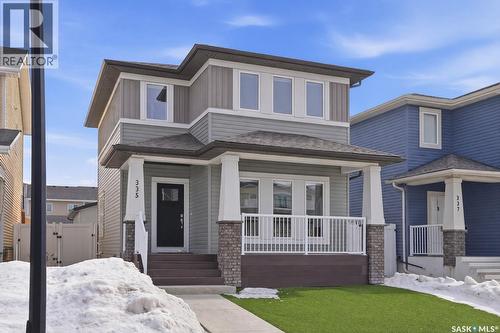 335 Secord Way, Saskatoon, SK - Outdoor With Deck Patio Veranda With Facade