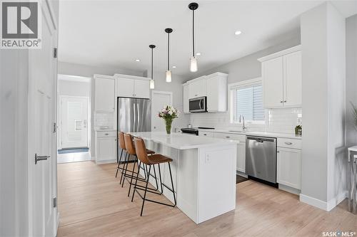 335 Secord Way, Saskatoon, SK - Indoor Photo Showing Kitchen With Stainless Steel Kitchen With Upgraded Kitchen