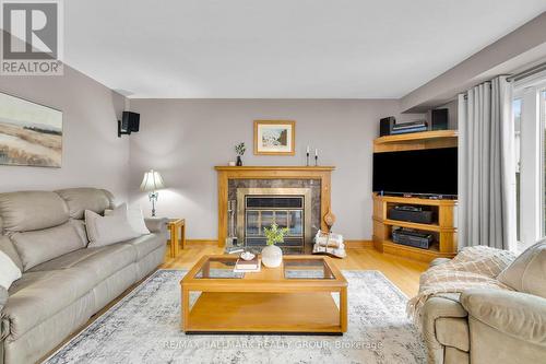 5 Ellisson Way, Ottawa, ON - Indoor Photo Showing Living Room With Fireplace