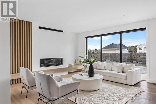 102 Silver Maple Circle, Thames Centre, ON - Indoor Photo Showing Living Room With Fireplace