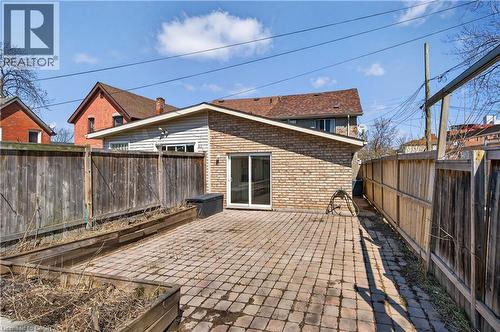 Fenced backyard featuring a patio area - 216 Robert Street, Hamilton, ON - Outdoor With Deck Patio Veranda