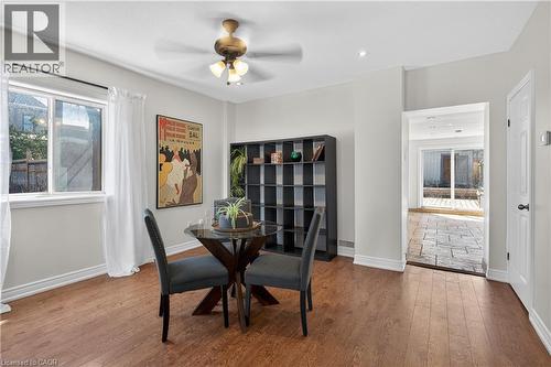 Dining space with hardwood / wood-style flooring and a ceiling fan - 216 Robert Street, Hamilton, ON - Indoor Photo Showing Dining Room