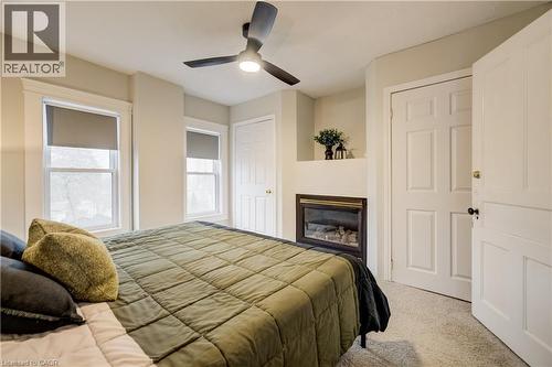 25 John Street, Cambridge, ON - Indoor Photo Showing Bedroom With Fireplace