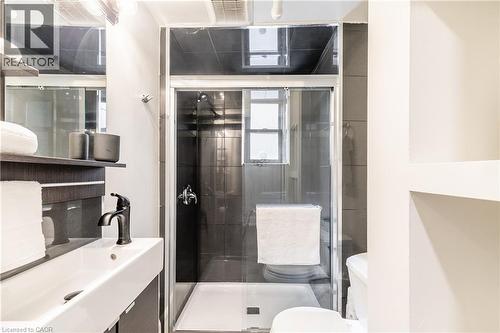 Bathroom featuring a shower stall and vanity - 14 Duke Street, Hamilton, ON - Indoor Photo Showing Bathroom