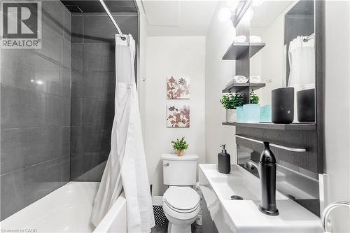 Bathroom with toilet and shower / tub combo - 14 Duke Street, Hamilton, ON - Indoor Photo Showing Bathroom
