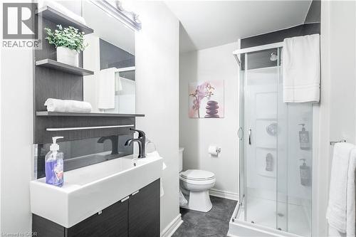 Bathroom featuring vanity and a stall shower - 14 Duke Street, Hamilton, ON - Indoor Photo Showing Bathroom