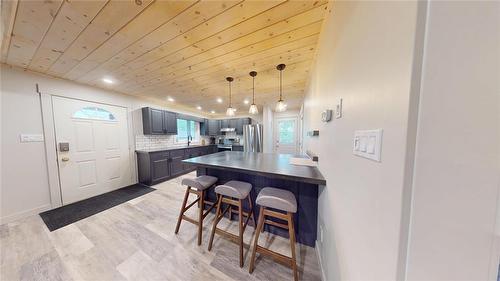 599 10 Highway, Onanole, MB - Indoor Photo Showing Other Room