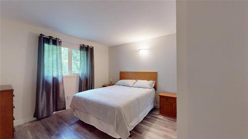 599 10 Highway, Onanole, MB - Indoor Photo Showing Bedroom